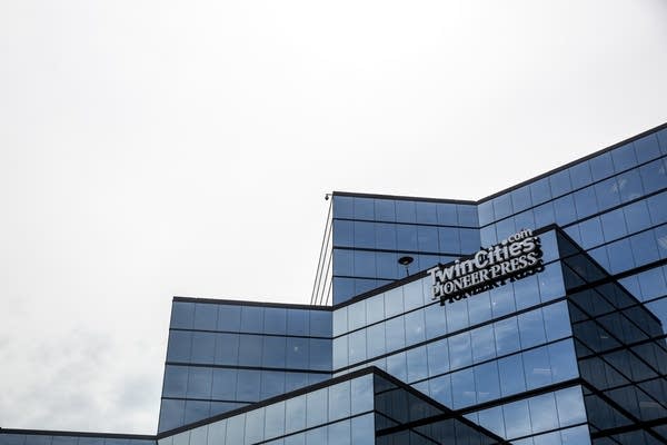 A Pioneer Press logo sits on a building in St. Paul, Minn.