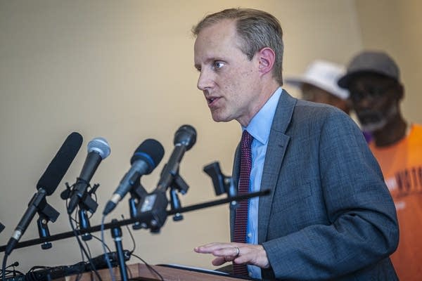A person speaks during a rally
