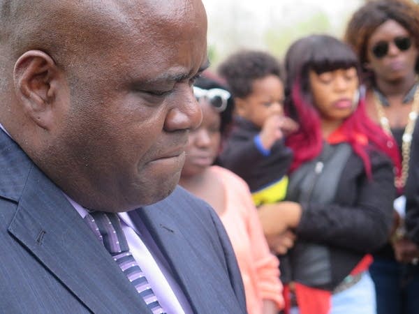 Pastor Harding Smith spoke to reporters.