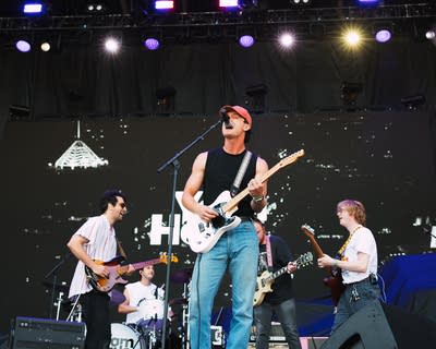 the band yam haus performing on stage