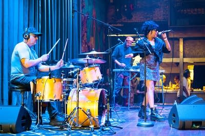 makr an eris performing on stage