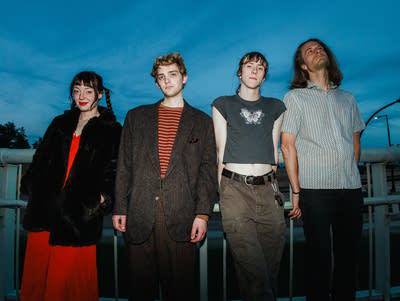 Four people pose for a photo in Duluth.