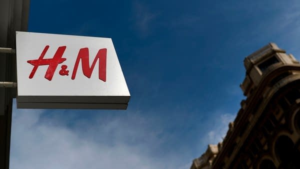 A picture shows the logo of Swedish fashion retailer H&M in Madrid on August 23, 2018.
