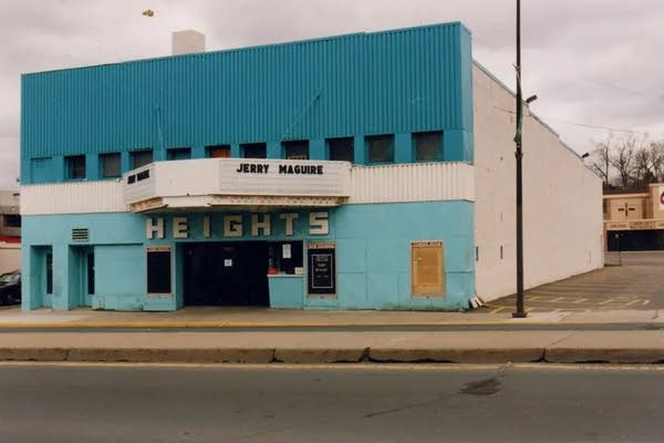 Vintage photo of a blue and white movie theater.