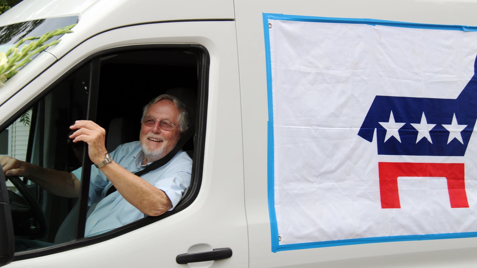 Dick Dahl drives a van promoting DFL candidates.