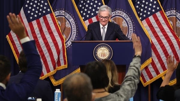 Fed Chair Jerome Powell fields reporter questions.