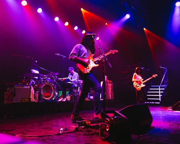 Khruangbin performing on stage