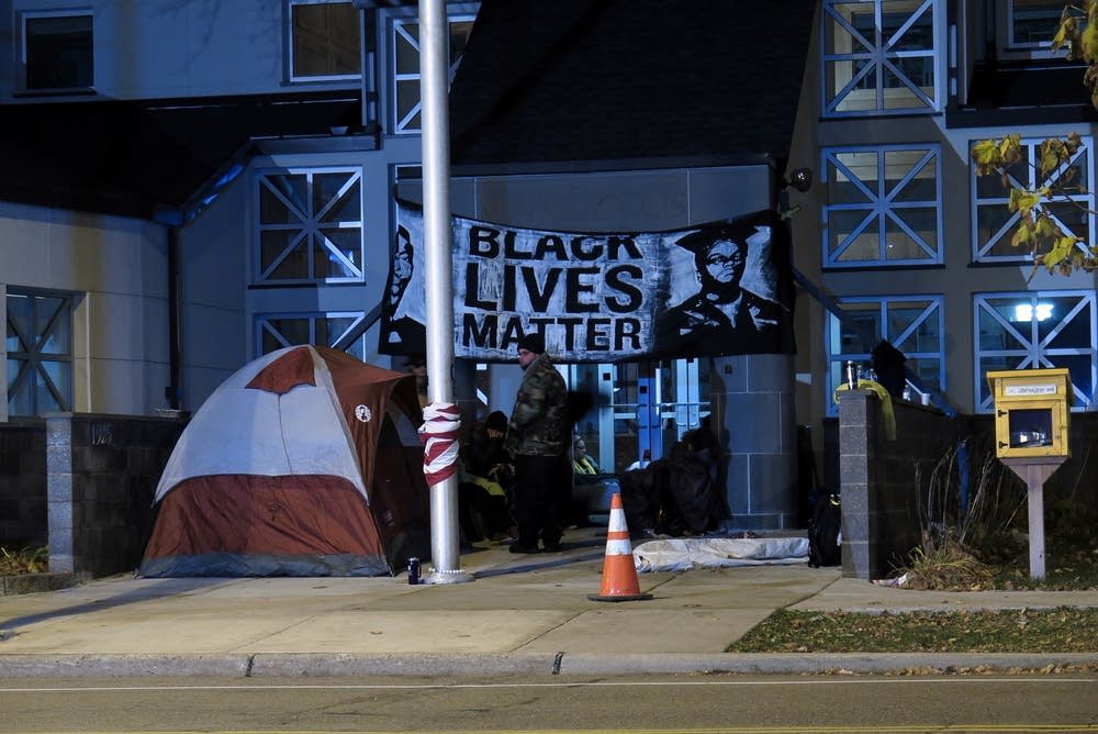 Protesters outside police station