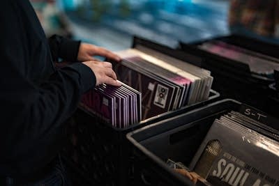 Person looking through records