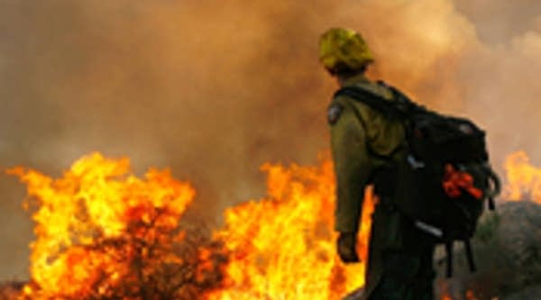 A U.S. Forest Service Hot Shot by a fire near Goleta, Calif.