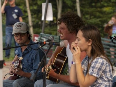 Lynden Graham and band performing on stage