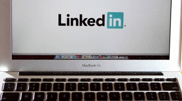 In this photo illustration, the LinkedIn logo is displayed on the screen of a laptop computer.
