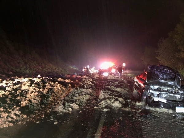 A mudslide covers a highway