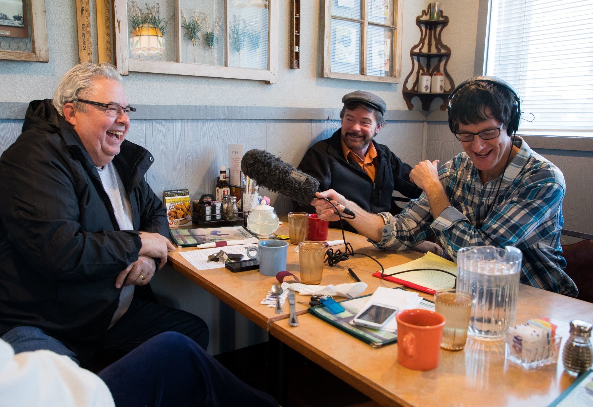 Bill Dian, left, and Doug Kern talk with MPR News reporter Dan Kraker.