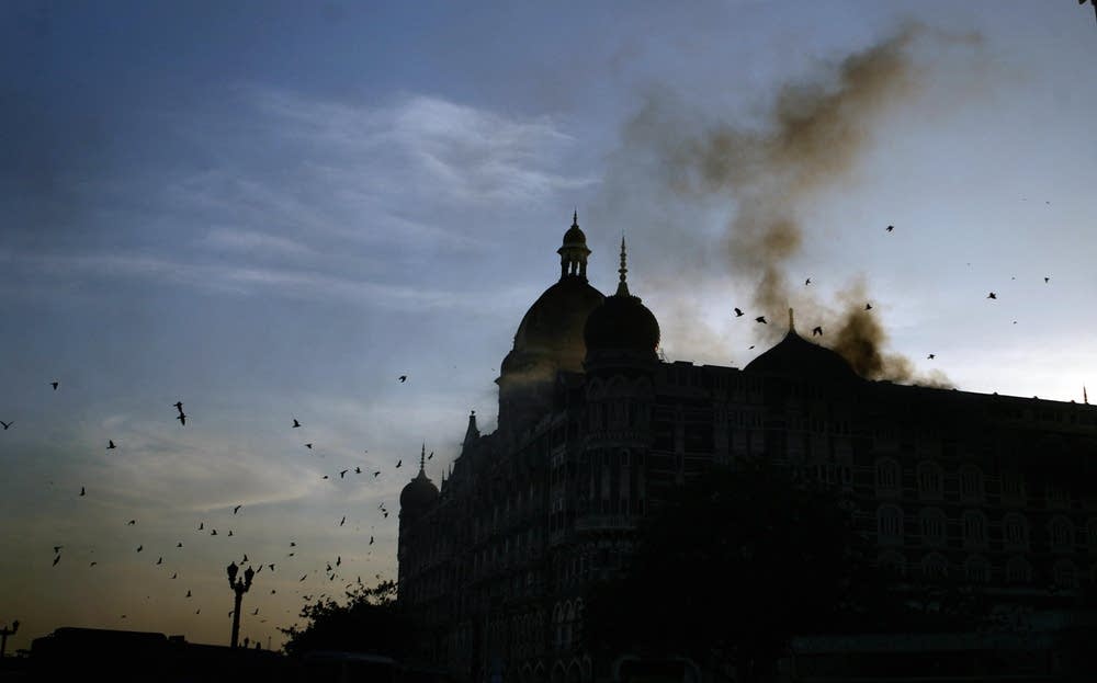 Smoke rises from the Taj hotel in Mumbai