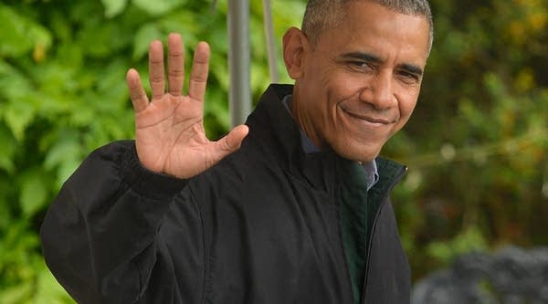 U.S.President Barack Obama waves to the press on Saturday before leaving for his week-long trip to Japan and Vietnam. While in Hanoi, Vietnam, Obama announced a series of business deals between American companies and Vietnamese businesses and entities.