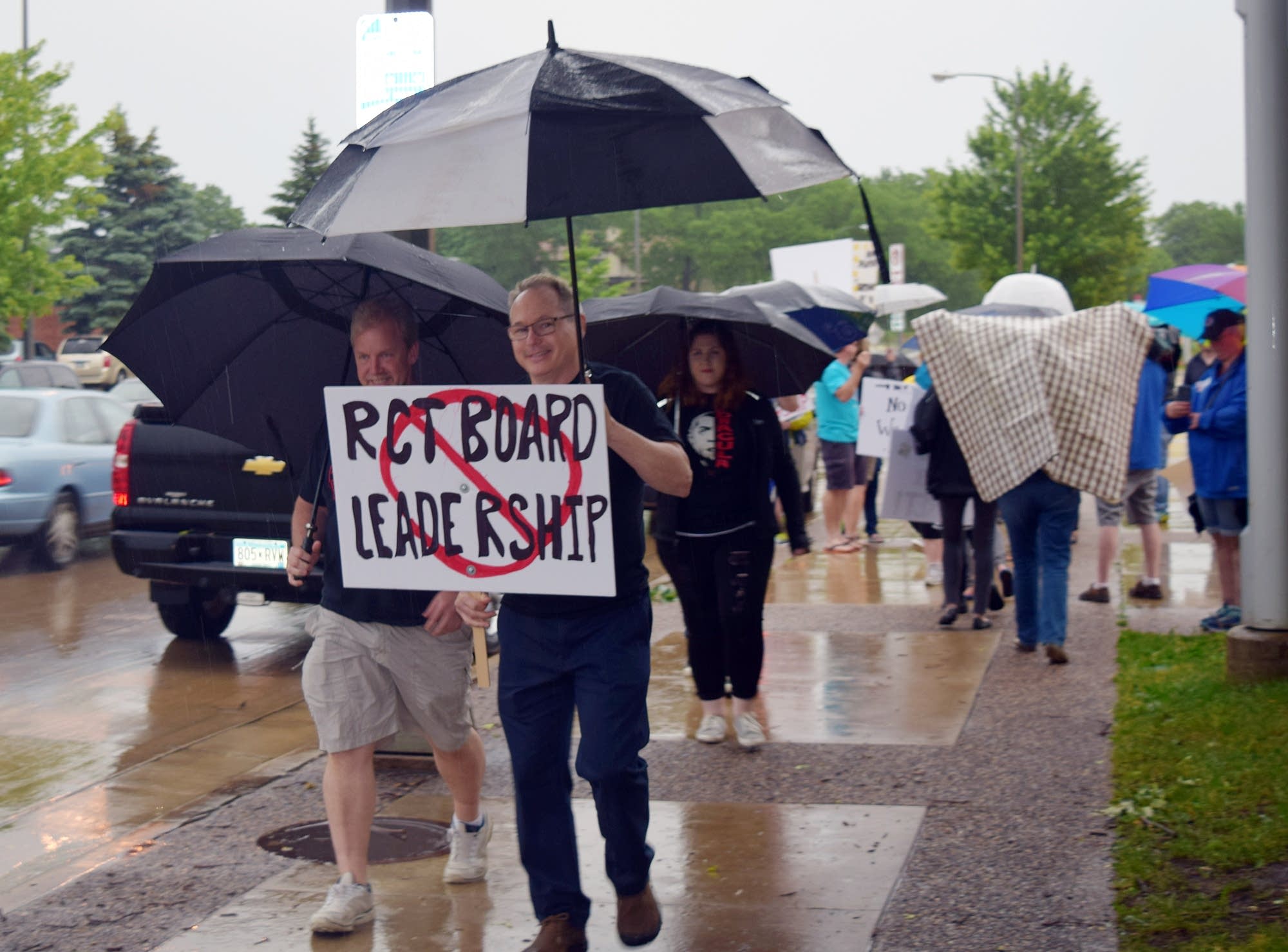 Rochester Civic Theatre volunteers protest the theater's board in June.