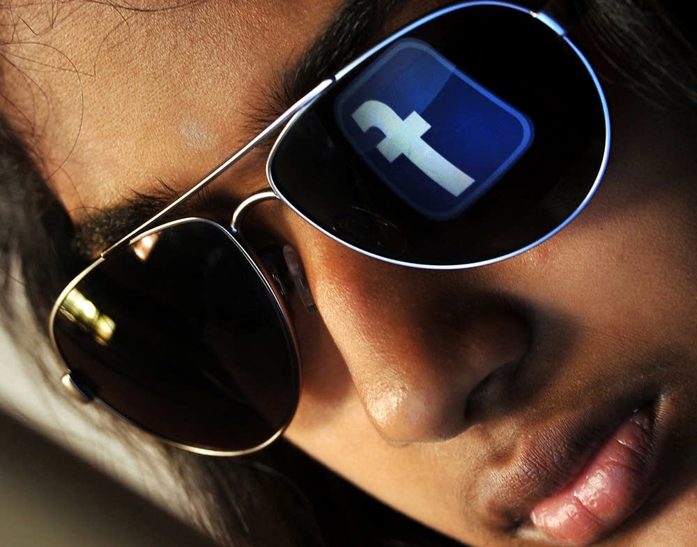 Facebook logo reflected