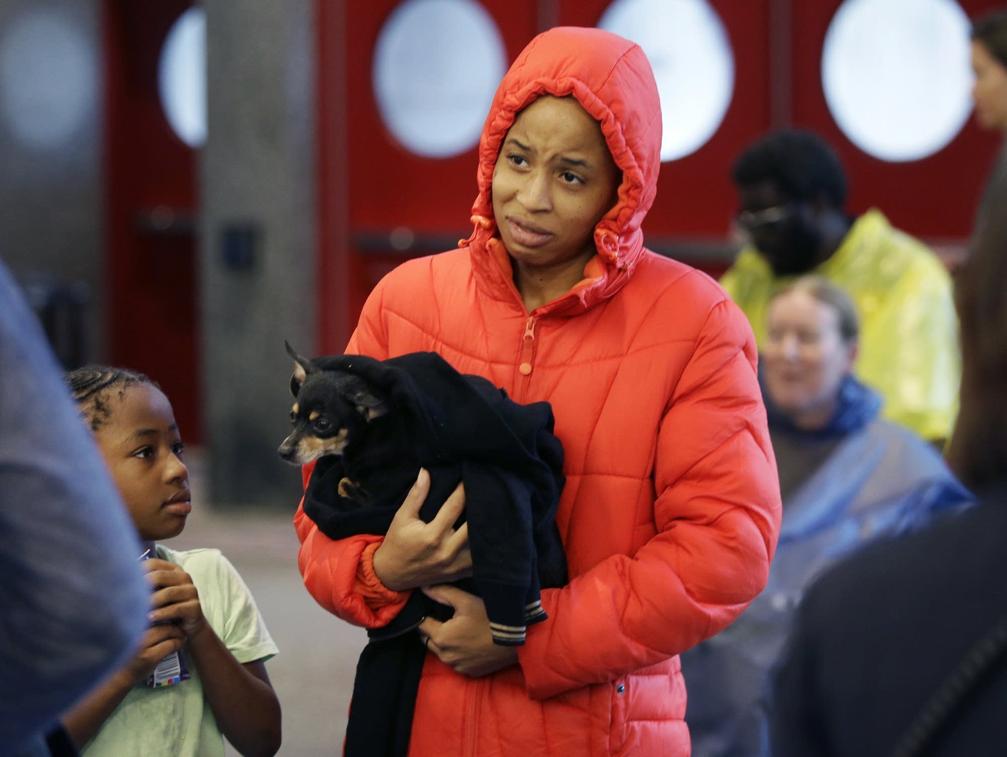 D'Ona Spears is told that she cannot bring her dog into the shelter