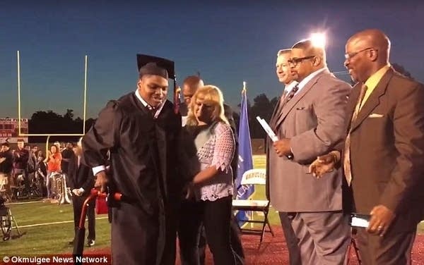 Student walks for the first time… to get a diploma
