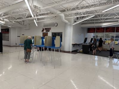 A large space is set up to accept voters.