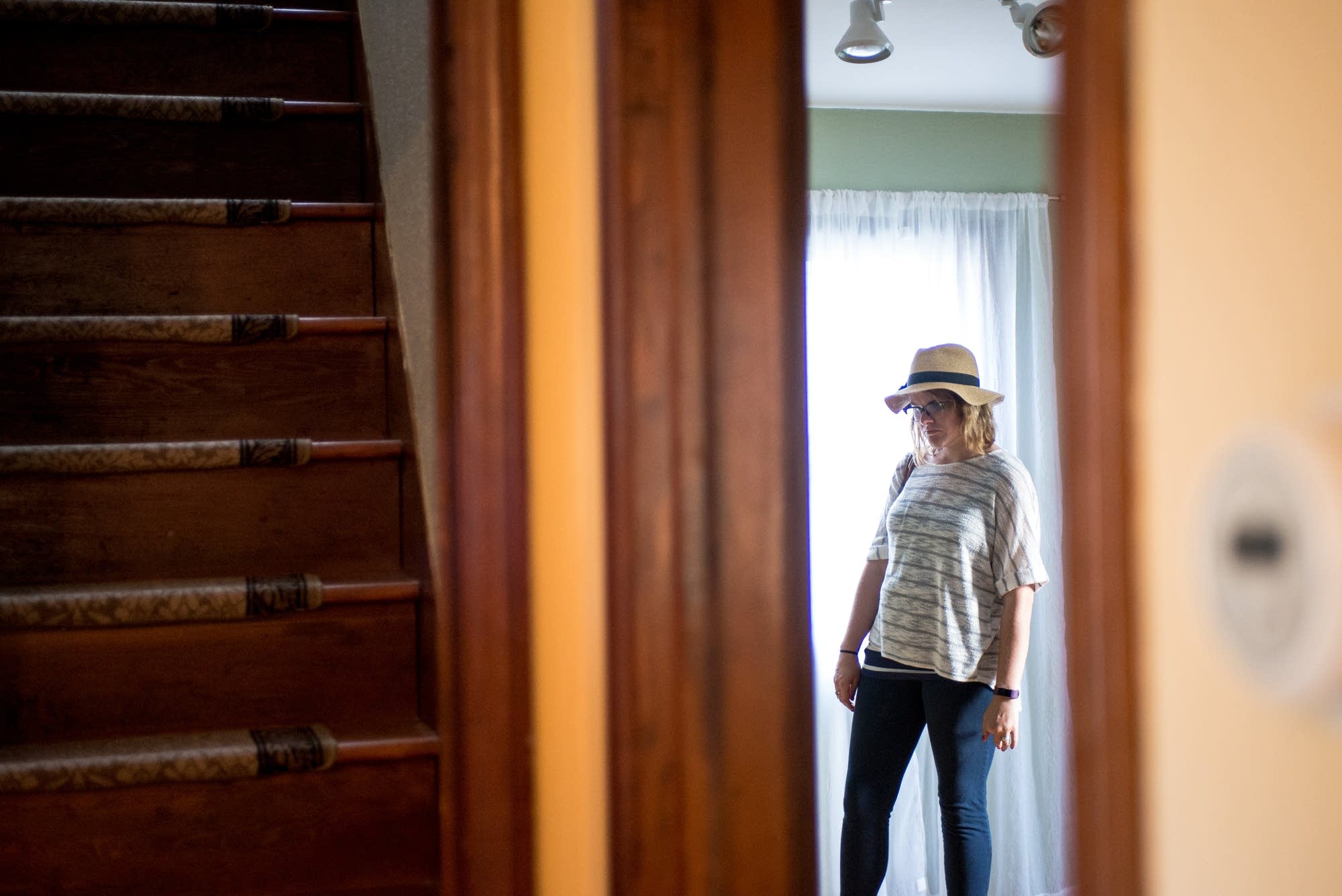 First-time homebuyer Crystal Rose-Wainstock inspects her new home.