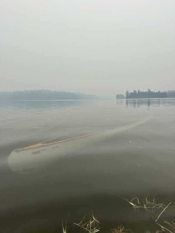 Canoes under water