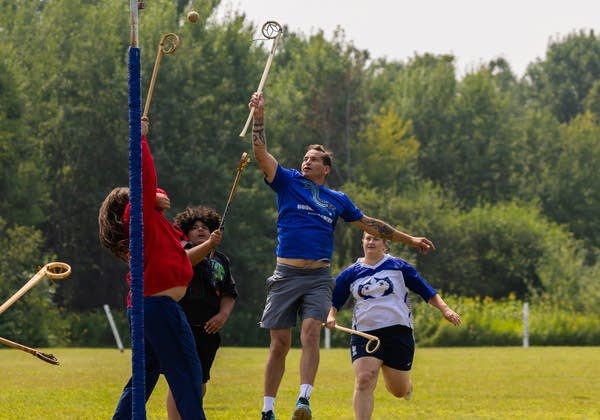man scores goal in stickball