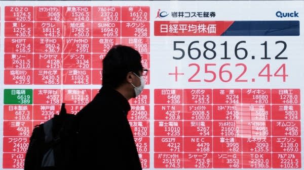 Tokyo's stocks soar after a landslide at the polls
