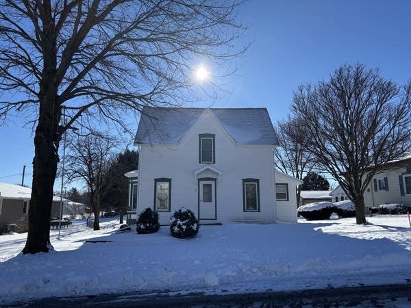 A view of a house from the street.