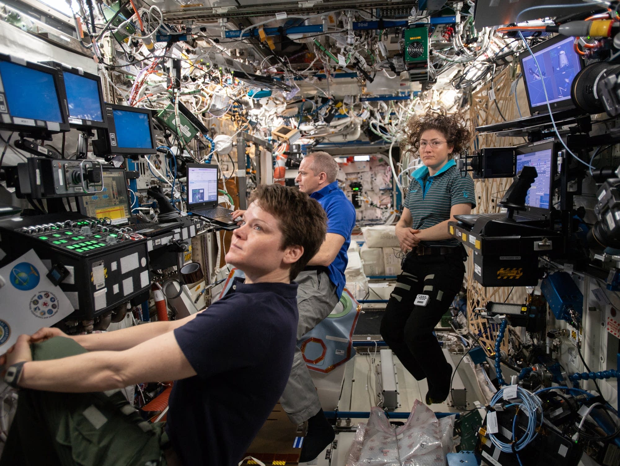 Flight engineers Anne McClain, David Saint-Jacques and Christina Koch