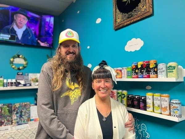 Couple stands in shop