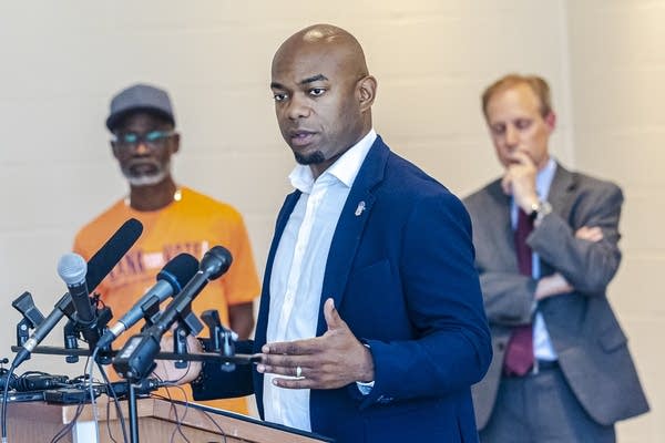 A person speaks during a rally