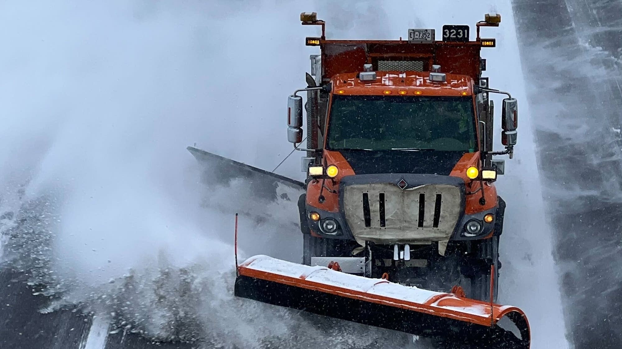Snow continues across southern Minnesota during busy holiday travel weekend