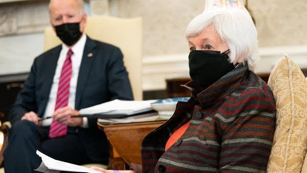 Treasury Secretary Janet Yellen (right) meets with President Joe Biden in the Oval Office of the White House on Jan. 29, 2021 in Washington.