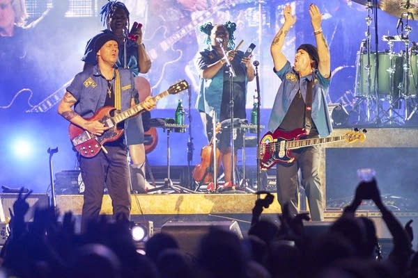 Brandi Carlile and band performing on stage