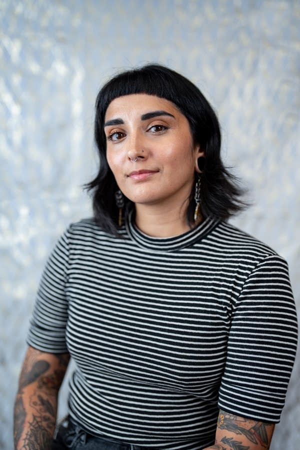 A person poses for a photo