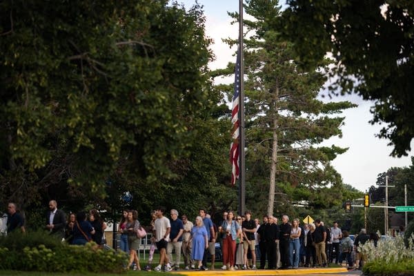 People wait in line
