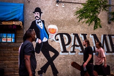 people outside of palmers bar