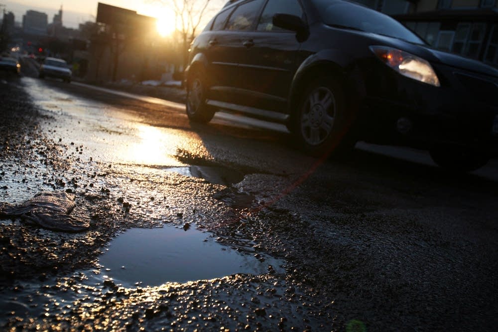 Pothole filled road