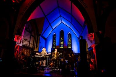 A band performing onstage