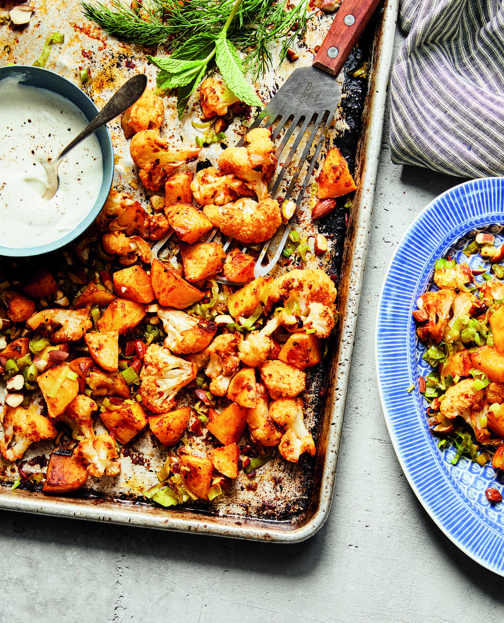 Roasted Cauliflower and Potatoes with Harissa, Yogurt, and Toasted