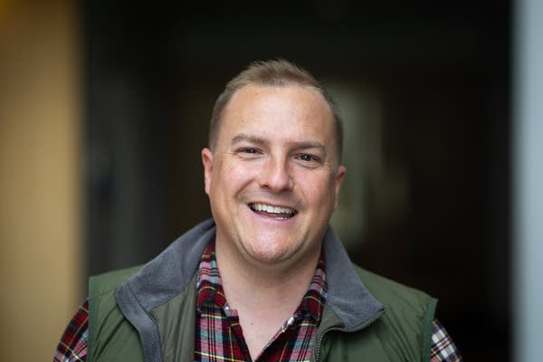A man poses for a photo