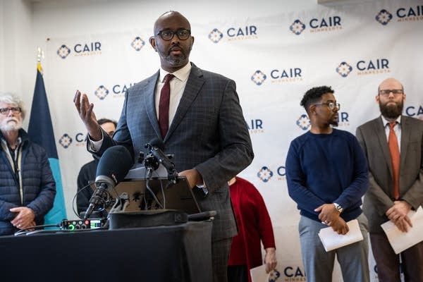A man speaks at a press conference