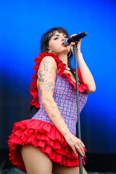 Rebecca Black singing on stage