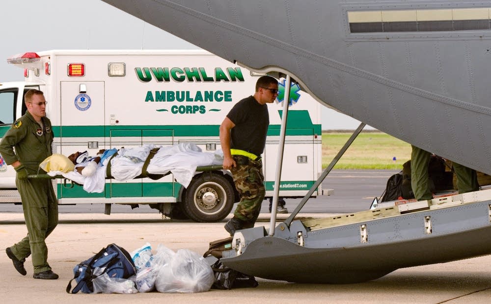 A crew from on a medical evacuation C-17
