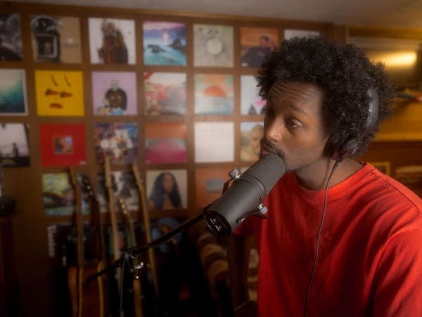 Local producer Zak Khan and musician Kinfu work on music in Khan's South Minneapolis studio.
