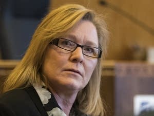 Lt. Gov. Michelle Fischbach chats with her lawyers.