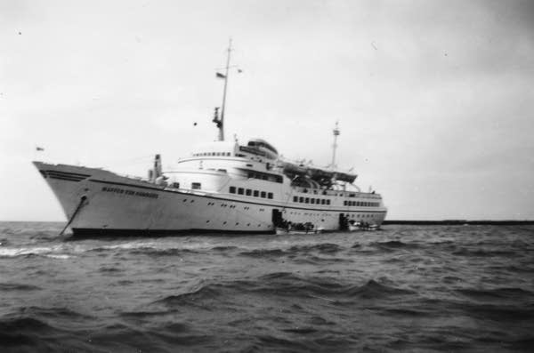 Black and white photo of huge ocean liner from c. 1955