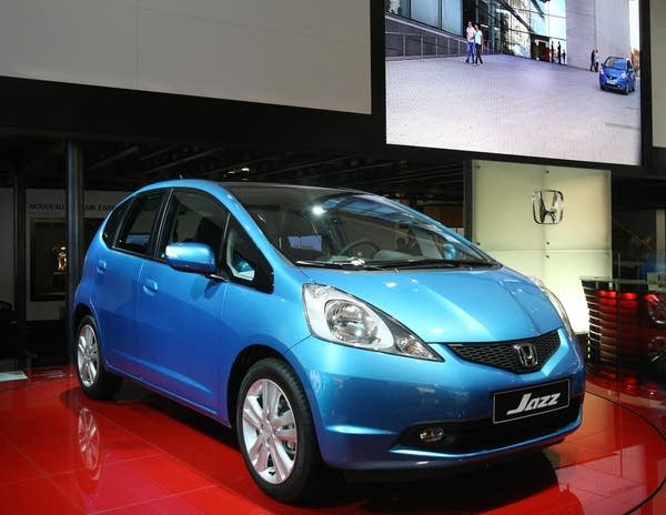 A brand-new automobile on display at an auto show